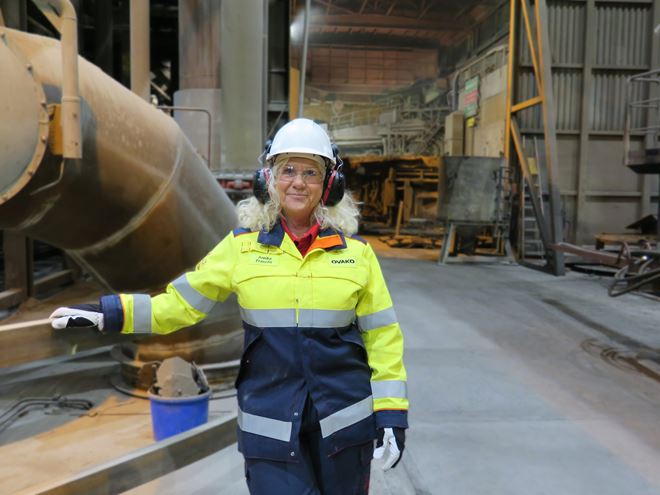 Annika standing in a steel production site