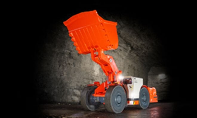 Red Sandvik dumper in mining environment